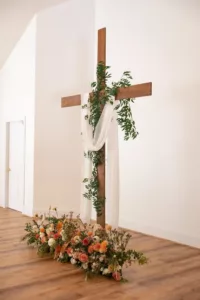 Chloe and Jake floral cross altar